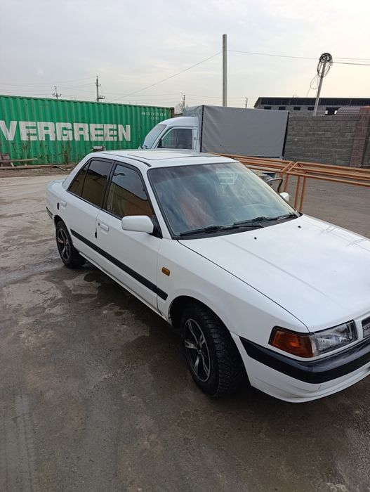 Mazda 323 норм сос