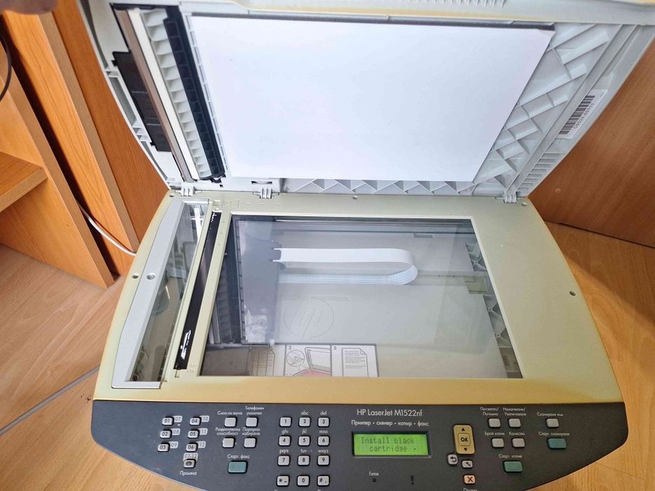 Лазерен принтер, копир, скенер, факс  МФУ HP Laserjet M1522NF