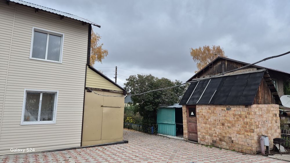 Двух этажный коттедж