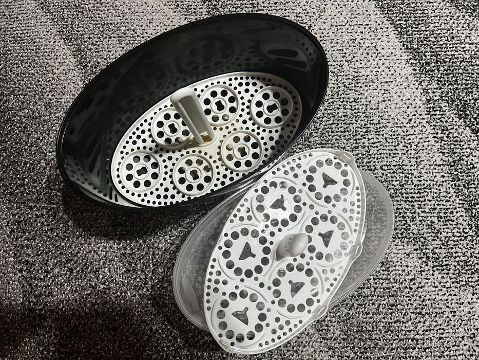 Стерилизатор за бебешки шишета и биби Tommee Tippee