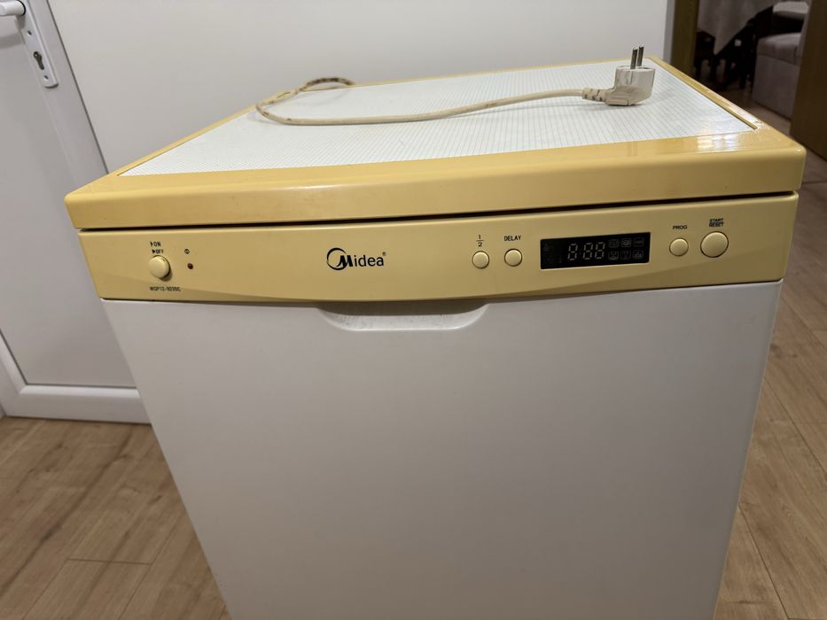 Садомиалня Midea