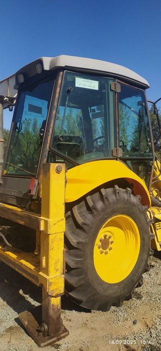 New holland 2009  расход йок ишга тайор   нархи 350 миллион келшамиз