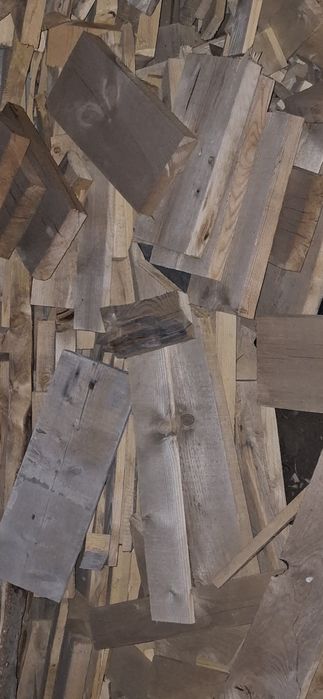 Дрова из досок  кучами