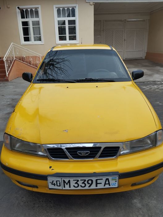 Nexia 1997 sariq zavod rangi oq