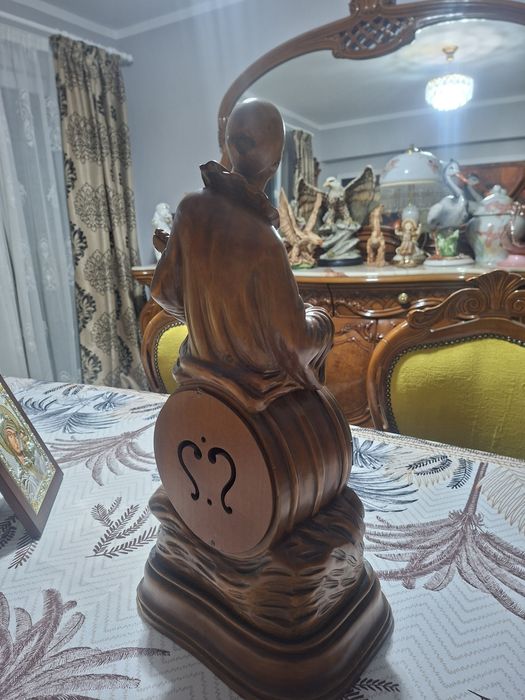 Sculptura lemn ceas mecsnic