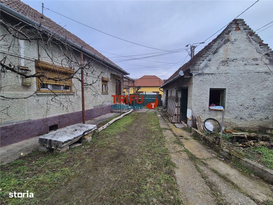 Casa in cartierul Barabant 1651mp teren, multiple posibilitati