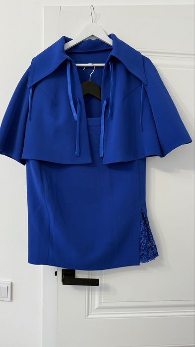 Продается костюм с юбкой