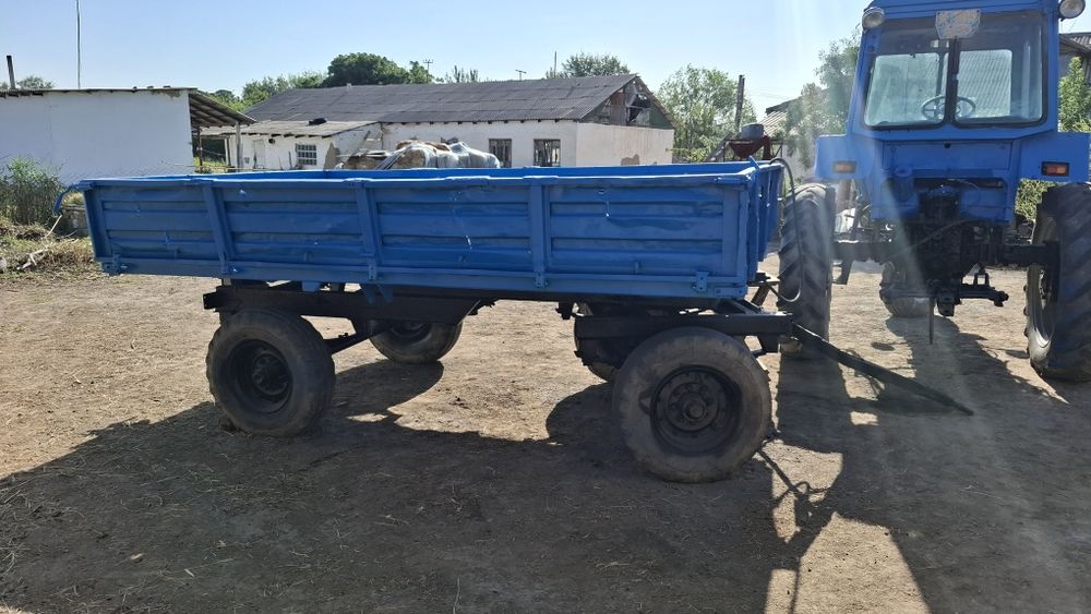 Трактор мен телешка сатылады