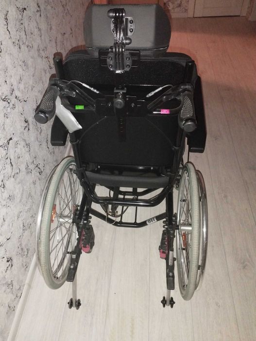 Многофункциональное кресло-коляска
