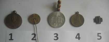 Княжевски двустранен позлатен медал и четири значки над 100 години