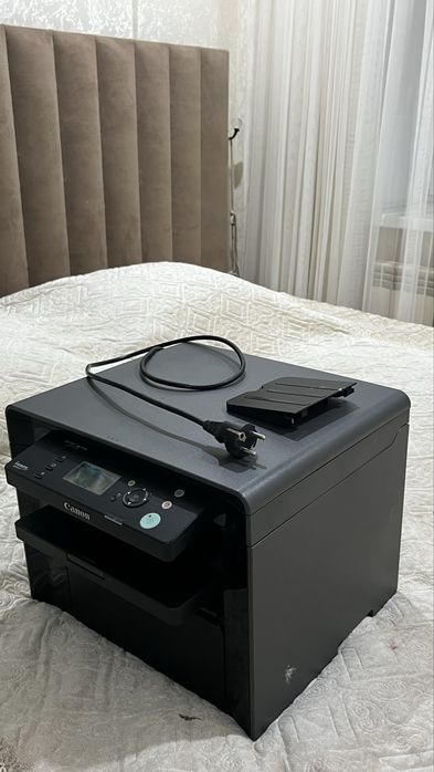 Это модель Canon i-SENSYS MF4410