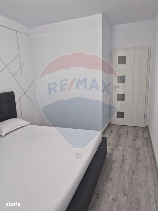 Apartament luminos cu 2 camere, mobilat complet si cu loc de parcare
