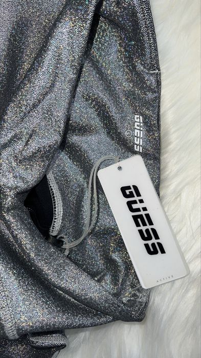 Colanti holografici Guess S si top Levi’s M