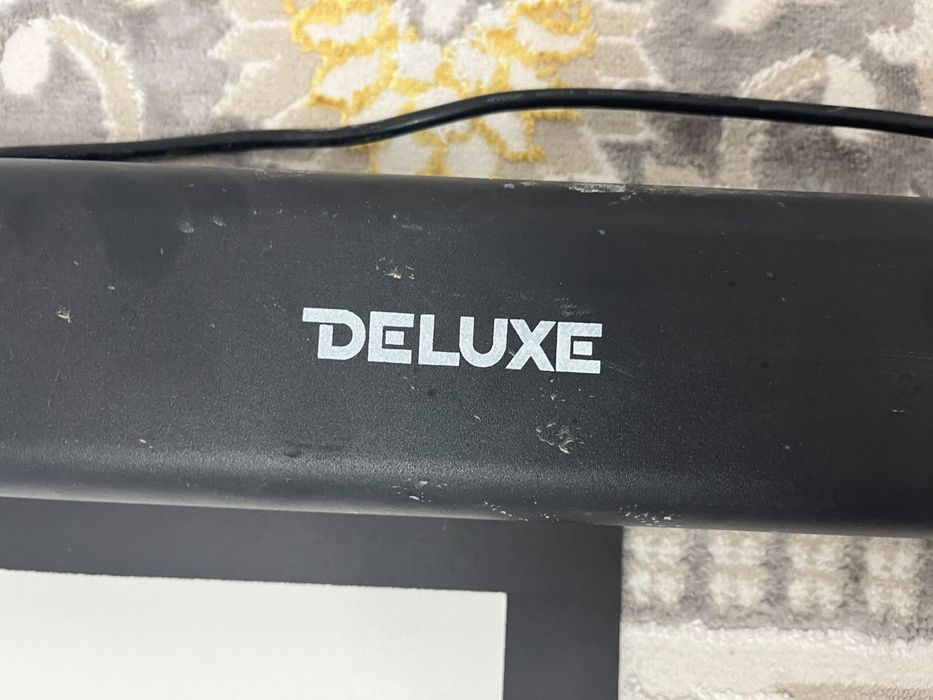 Deluxe электрлі экран сатылады.