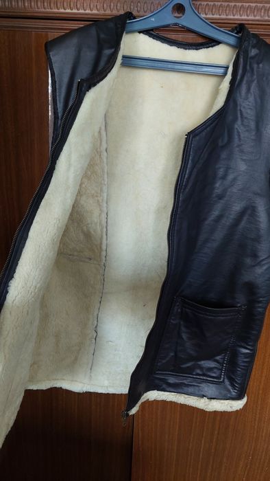 Теплая безрукавка