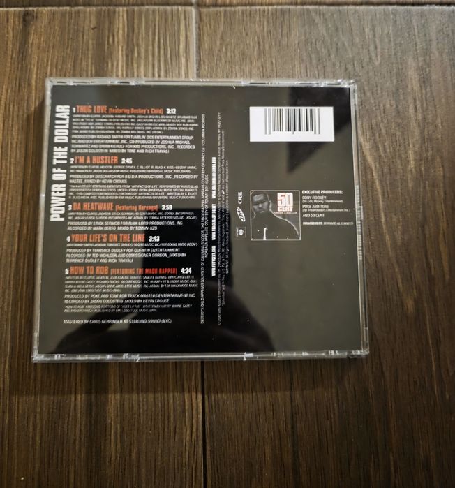 CD дискове на Pop Smoke и 50 cent
