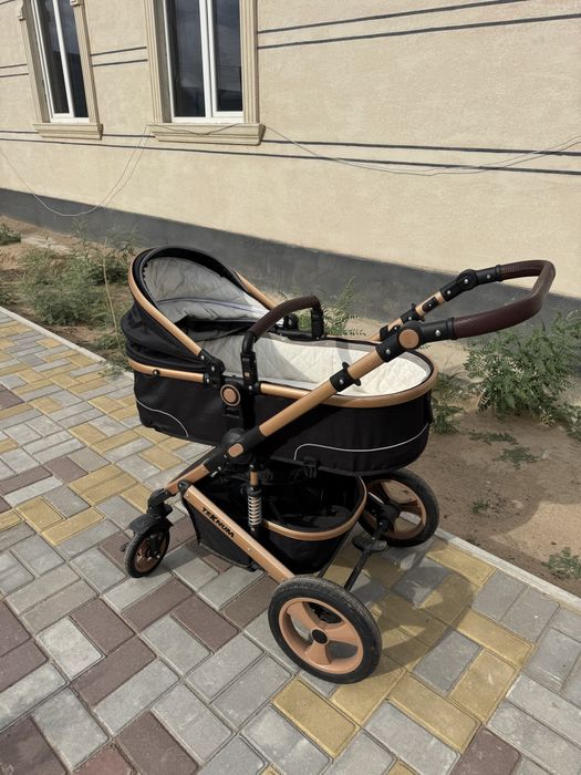 Коляска всесещонна