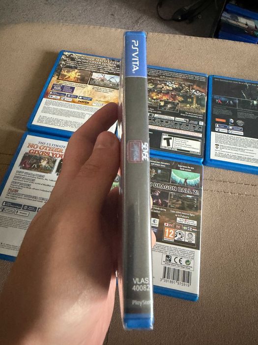 6 игри за PS Vita комплект, Blazblue/DBZ/Soul Sacrifce/Batman/Dragons Crown и Sense Cyberpunk story