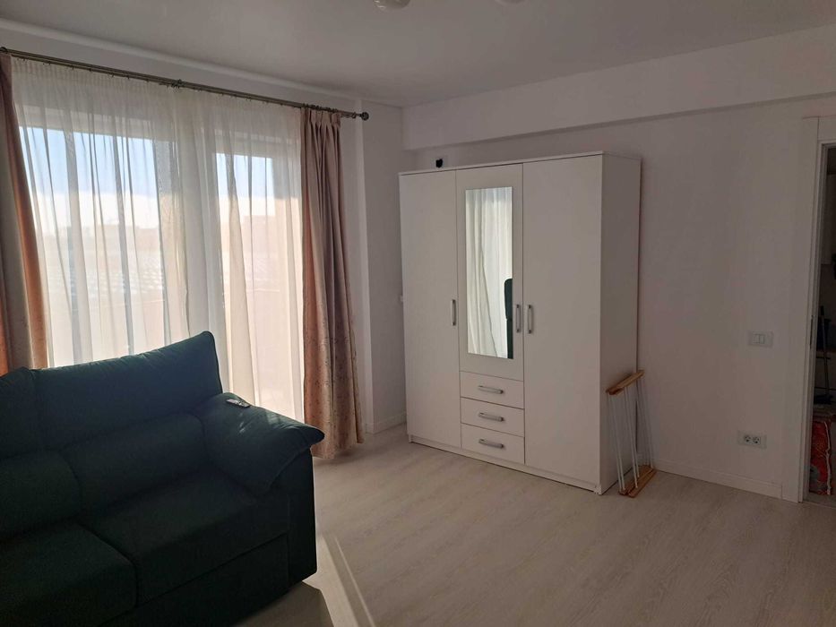 Inchiriez apartament cu 2 camere + parcare subsol