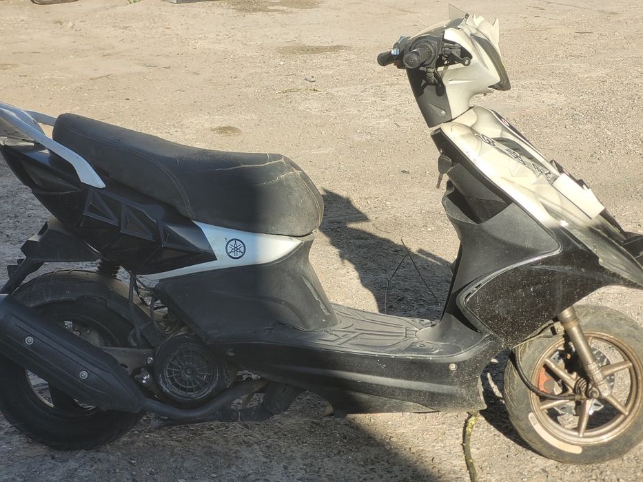 Скутер, мопед ангел