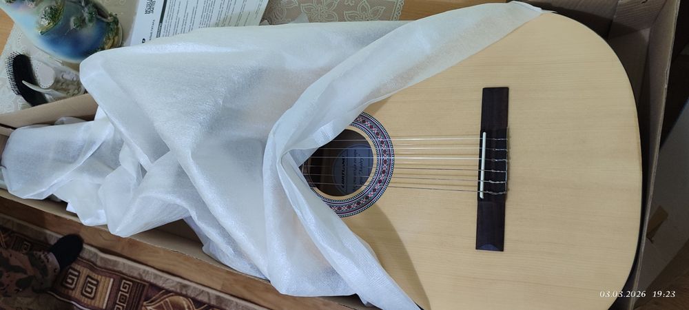 Акустическая гитара