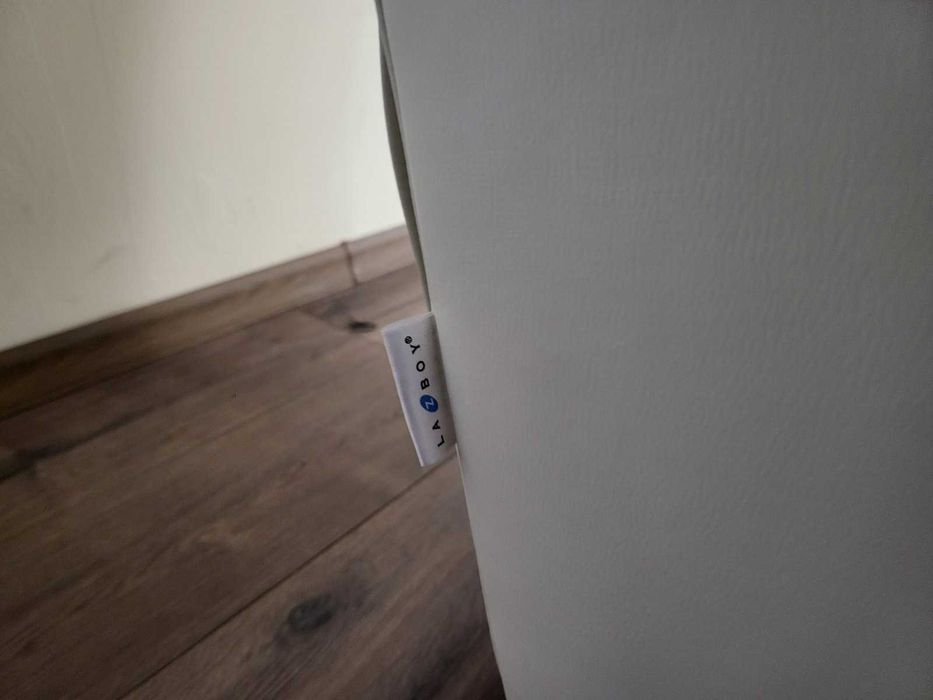 Светло кремав кожен фотьойл La-z-boy с ръчен релакс механизъм