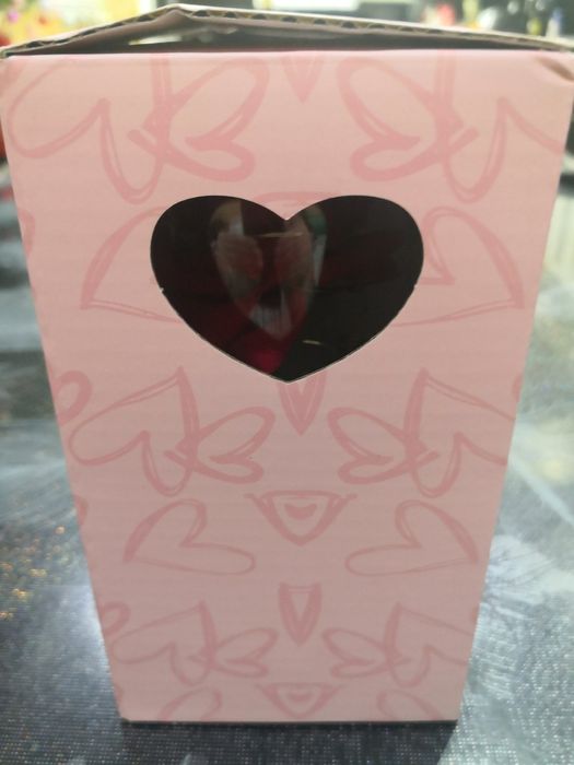 Светеща роза в стъкленица