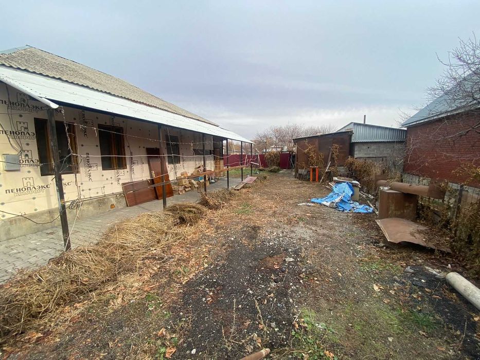 Дом, улица Калиева, Танат Империя