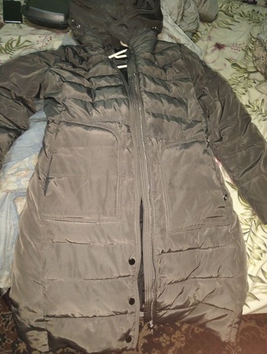 Продам женский пуховик  размер 48