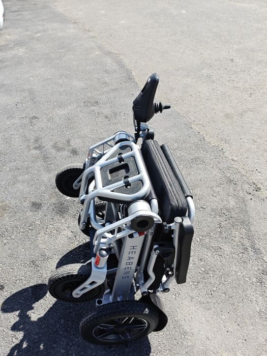 Нвалидная коляска с электроприводом.