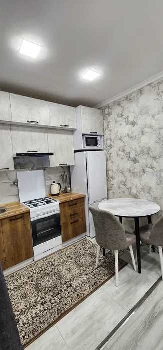 Бузбазар 1/2/4 кирпичный дом Общая площадь 33 кв.м ориентир Анор Банк