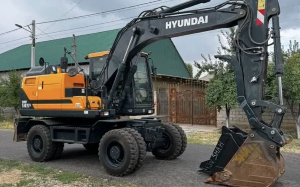 Аренда и услуги колёсного экскаватора Hyundai HW145+ — Шымкент