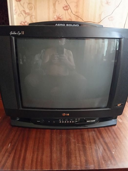 Телевизор LG мультисистема G OLben Eye 2 золотой глаз