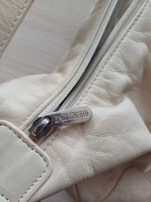 Poseta Piele, Enzo Bertini