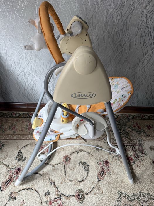 Детская качелья Graco