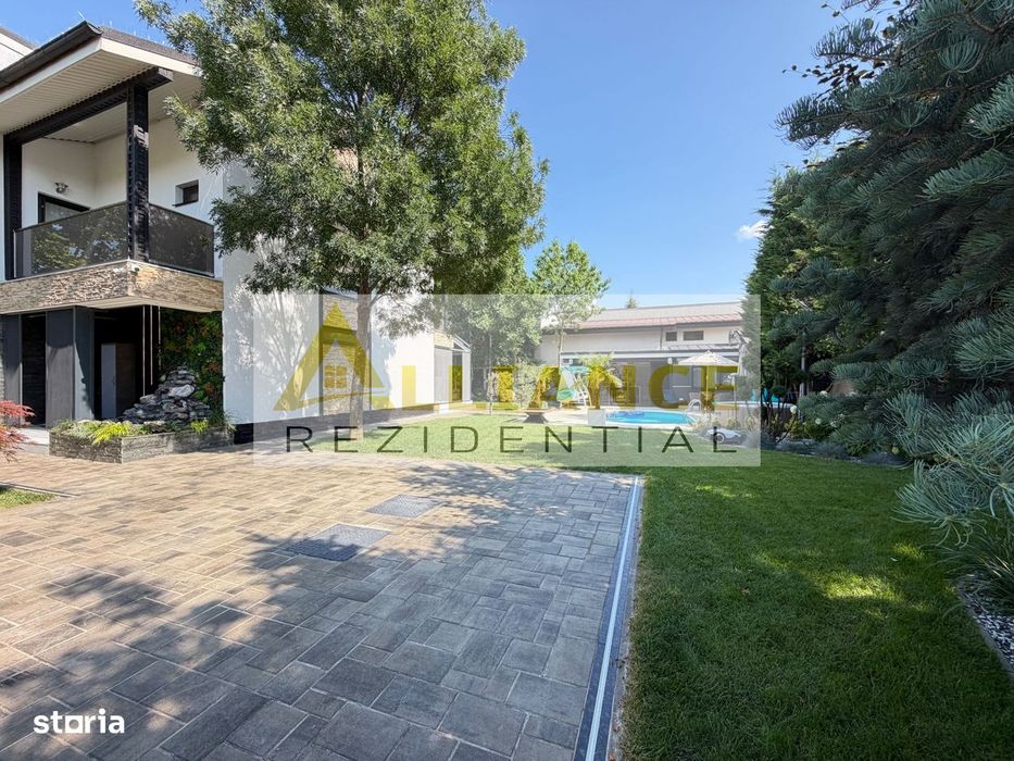 Casa P+1+M cu teren de 650 mp, piscina si curte complet amenajata