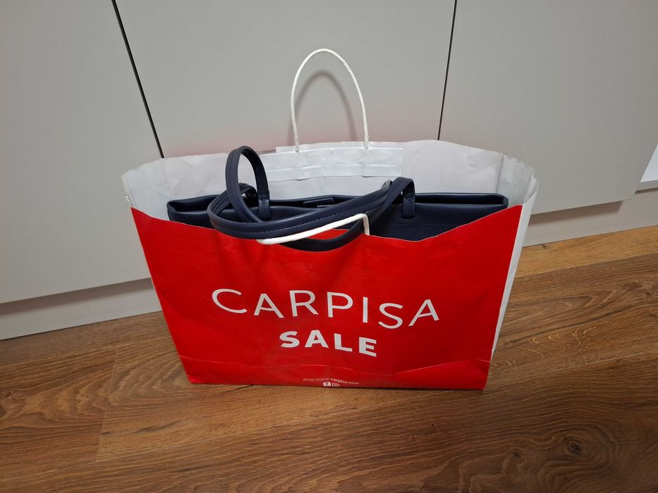 Posetă nouă Caprisa