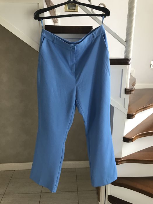 Продам голубой брючной костюм