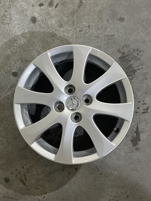 Set 4 jante aliaj 15  4x100 Originale Mazada Demio