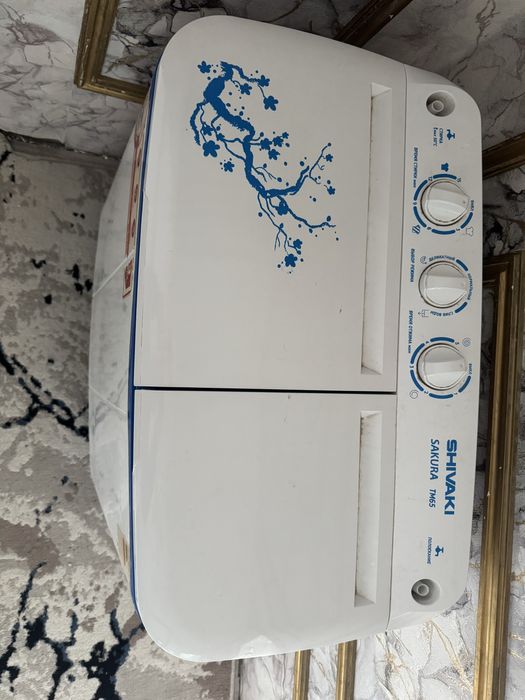 Shivaki брендига тегишли кир ювиш мошина