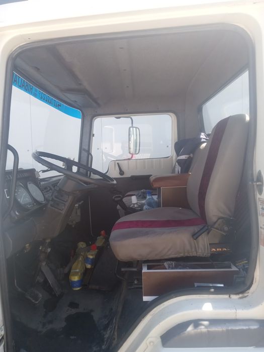 Nissan L 70-09,cu macara și basculare