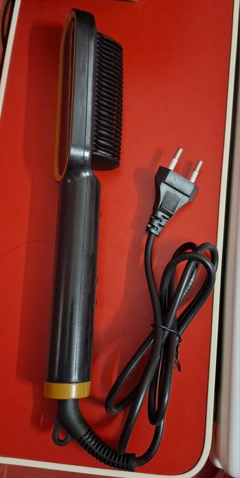 Perie termică de îndreptat părul Wavytalk 2 în 1, de culoare neagră.