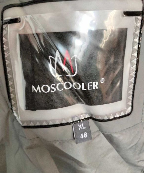 Продам пуховик 48 размера