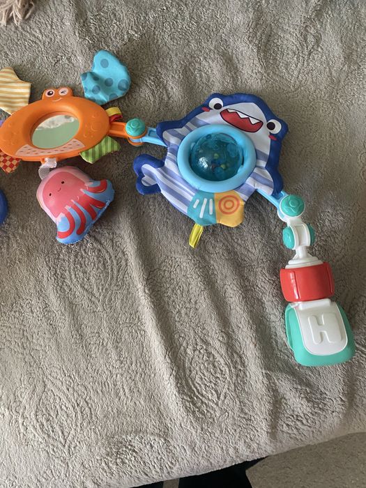 Jucarie pentru carucior/ patut Huanger ABS ajustabila