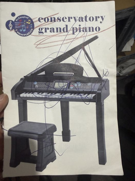 Pian conservatory grand piano
