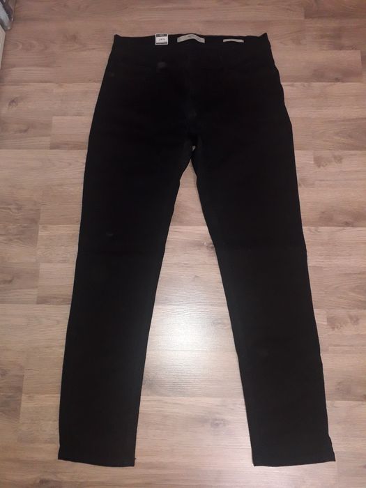 Джинсы черный новый