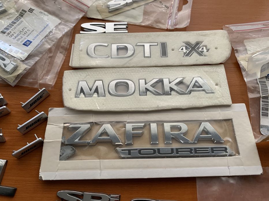 Sigla /Mokka/4X4/Sri/Elite/Emblema Bose/VW
