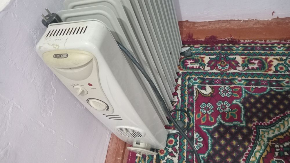 Масляной обогреватель в рабочем состоянии