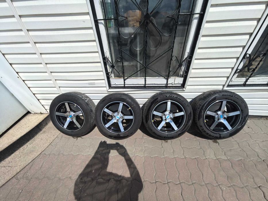 Продам диски с резиной комплект