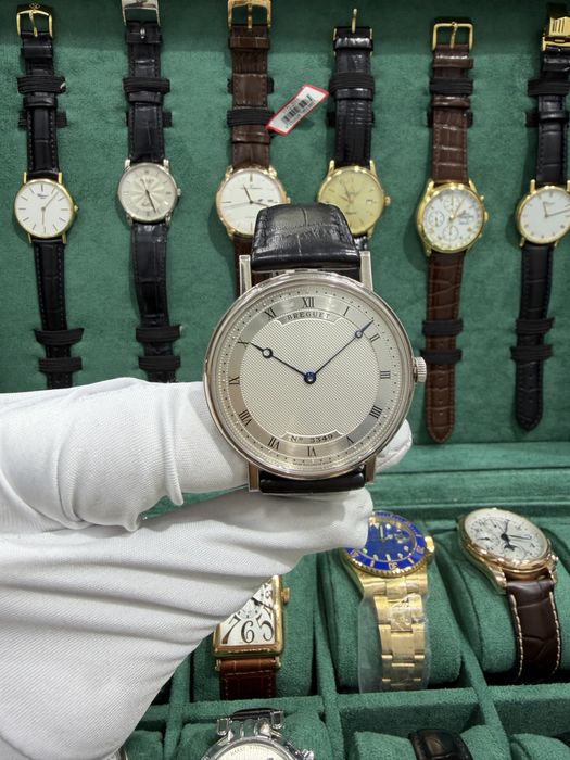 Золотые часыHarry Winston Premier Perpetual Calendar 18k